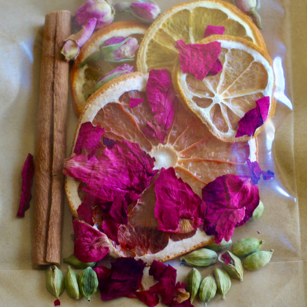 A simmer pot is a simple way to create a warm and inviting atmosphere in any space, and scents the air naturally. Infused with dried citrus slices, Cinnamon Sticks, Cardamom Pods, dried Rose Petals, and delicate Rose Buds.&nbsp; This all-natural mix fills your space with warm, comforting aromas that soothe the soul and lift the spirit.